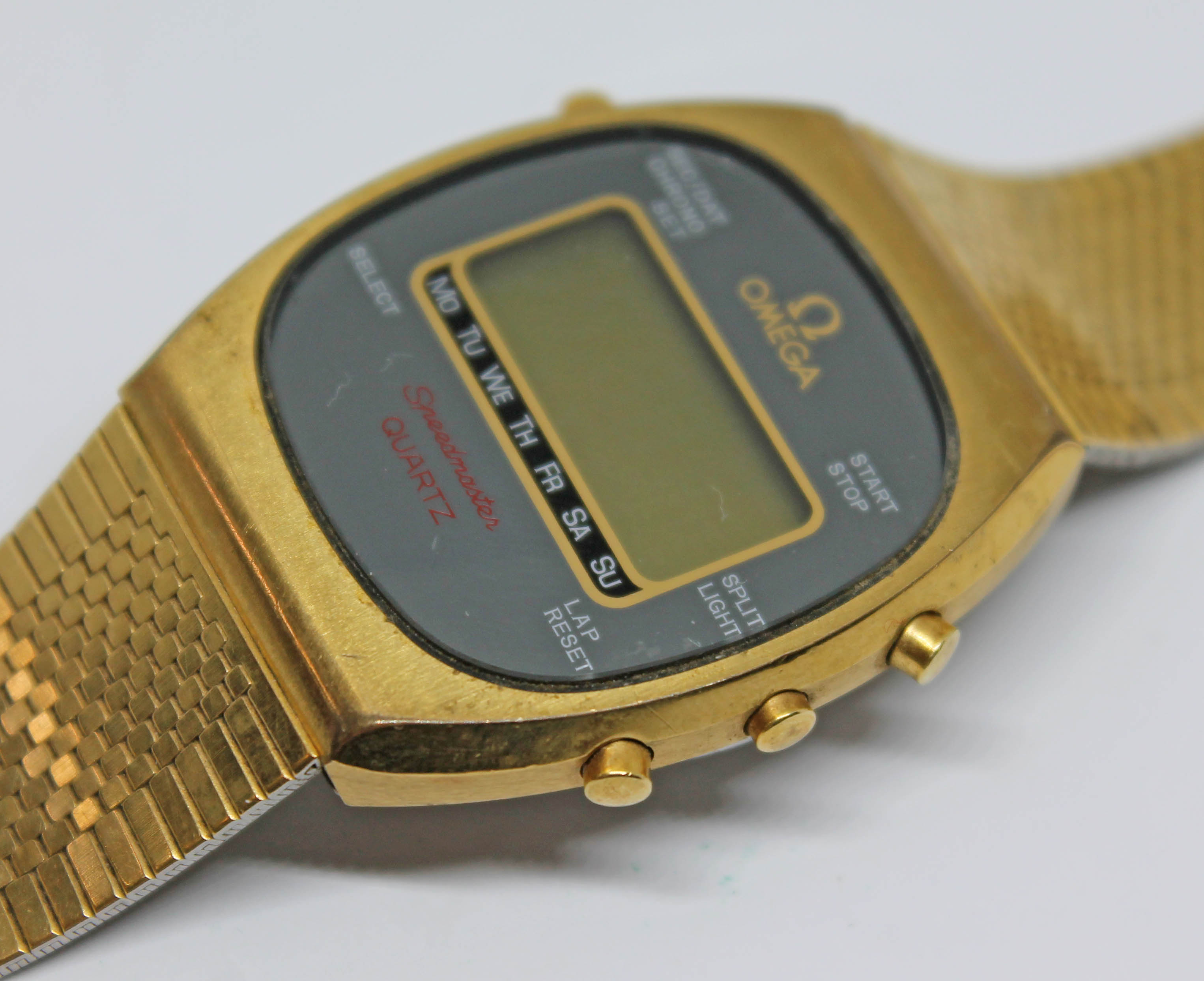 A 1979 gold plated Omega Speedmaster Quartz reference 188.0005, with digital display, 33mm case,