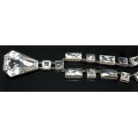 An Art Deco quartz rock crystal necklace, length 42cm, drop length 54mm, marked 'Sterling'.