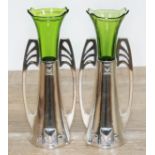 A pair of WMF Art Nouveau silver plated spill vases with green glass liners, height 18cm.