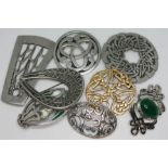 A group of eight brooches including Swedish, Celtic, silver and pewter etc.