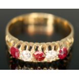 A hallmarked 18ct gold diamond and red stone ring, gross wt. 2.54g, size M. Condition - conchoidal