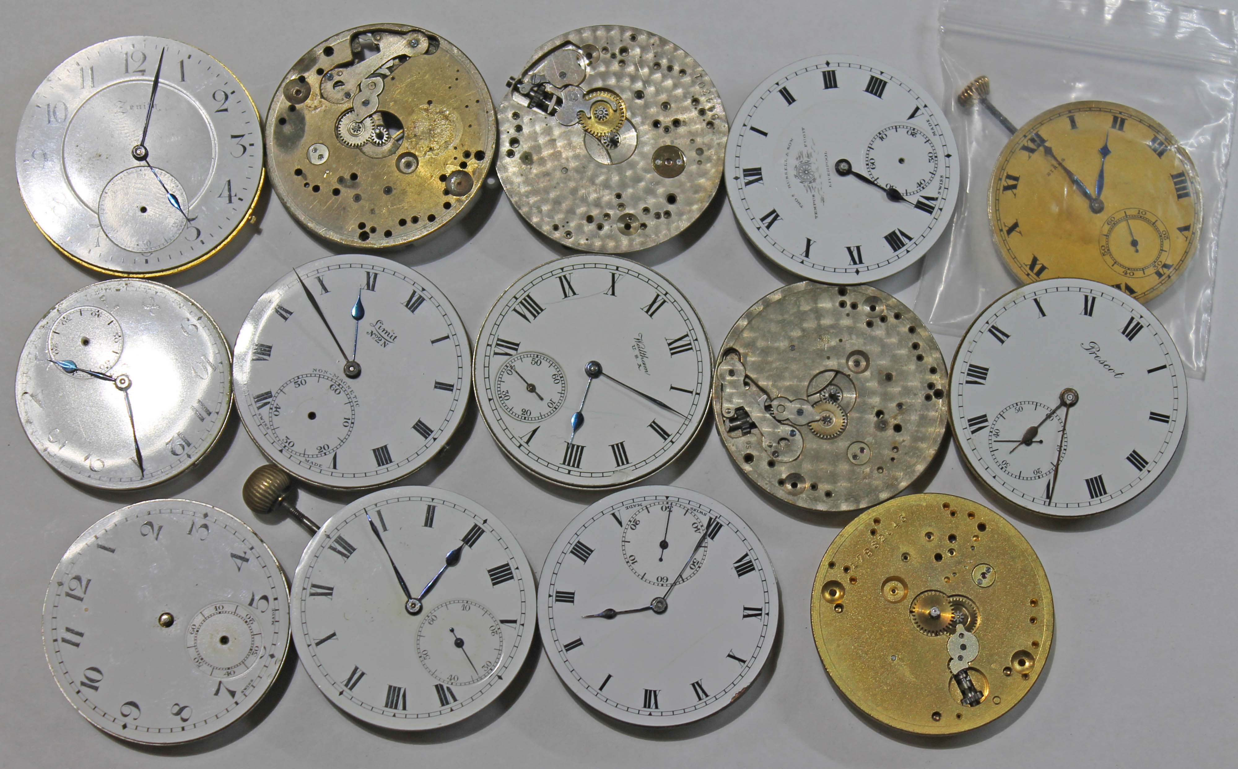 A collection of 14 pocket watch movements, some with dials and crowns, including a Birks 'Broker', - Bild 2 aus 2