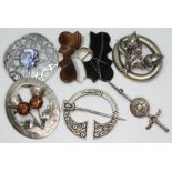 A mixed lot of brooches comprising a Scottish hallmarked silver plaid pin, another hallmarked silver