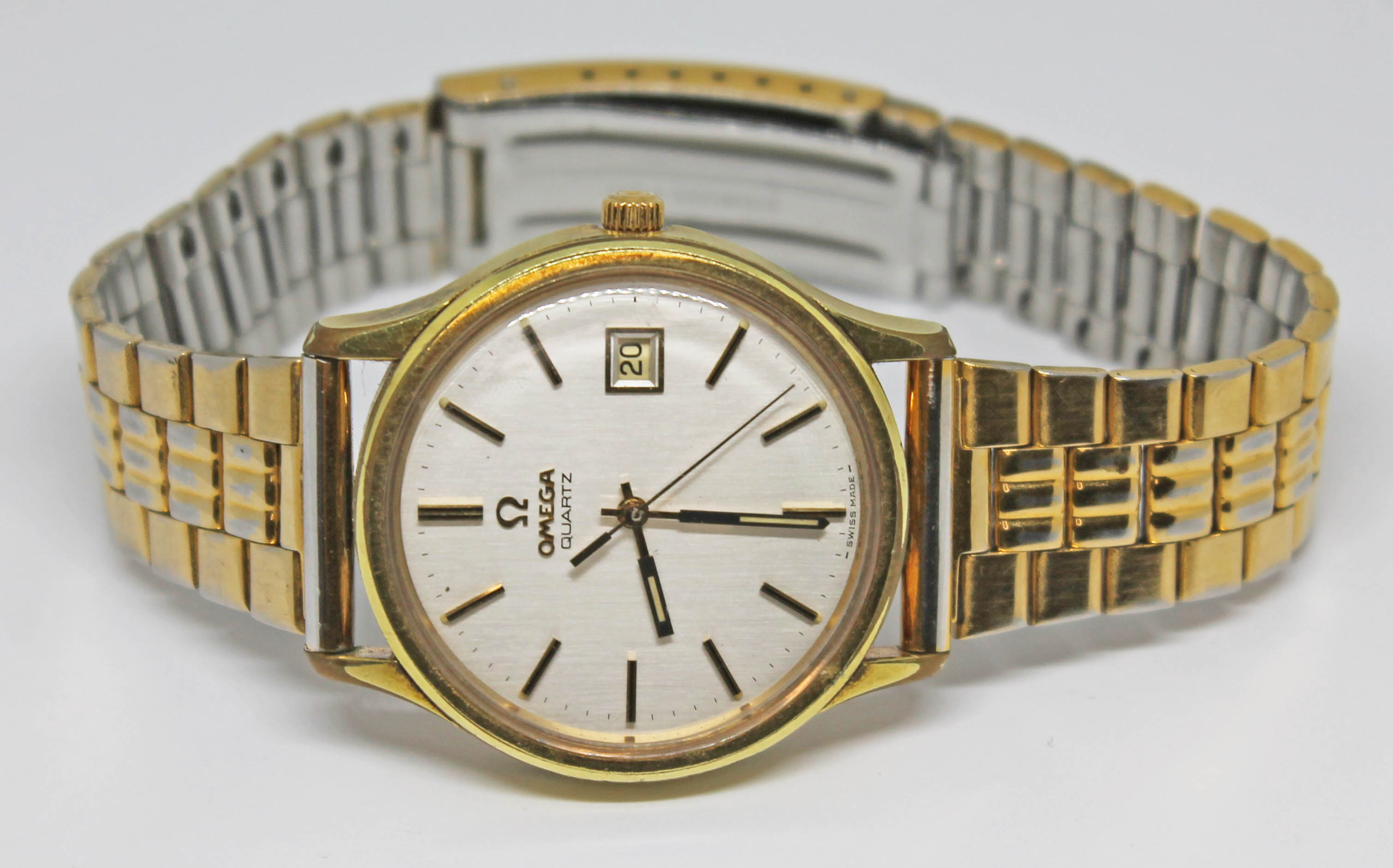 A 1977 gold plated Omega quartz 1960071 wristwatch, with signed champagne dial, hour batons in