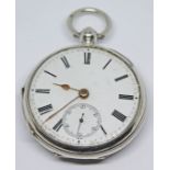 A Victorian hallmarked silver English lever pocket watch with white enamel dial, Roman numerals,