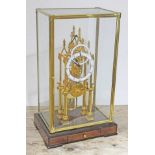 A brass single fusee chain driven skeleton clock under glass case, height 56cm. Condition: some