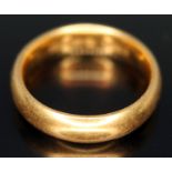 A hallmarked 22ct gold wedding band, wt. 6.47g, size K. Condition - good, no damage repair,