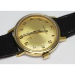 A vintage gold plated Caravelle (Bulova Watch Co.) wristwatch with signed gold tone dial and