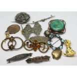 A mixed lot of antique and vintage costume brooches etc.