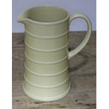 A Wedgwood Matt Straw pottery jug designed by Keith Murrary, height 24cm. Condition - small chip