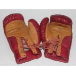 A pair of vintage boxing gloves.