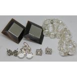 A small quantity of costume jewellery including a pair of vintage bakelite earrings, a pair of