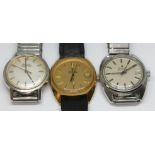 Three vintage Bulova Accutron wristwatches, comprising a gold plated cushion case ref. 3-922924, a