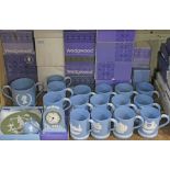 A collection of Wedgwood blue Jasperware, approx. 20 pieces including 15 Christmas mugs, twin