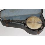 A Melody Minor mandolin banjo with case.