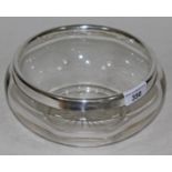 A glass bowl with hallmarked silver rim. diam. 20cm.