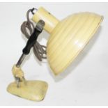 A retro beehive adjustable lamp.