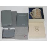 Concorde memorabilia comprising a hip flask, an atlas, a note pad and an address book, together with