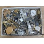A tray of mixed wristwatches, pocket watches, cases and movements.