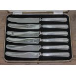 A cased set of hallmarked silver handled knives.