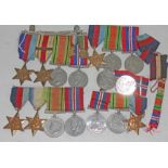 A mixed lot of WWII medal groups.