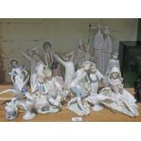 16 Lladro figures of different sizes, including nuns, 4 geese figures, and a mixture of other styles