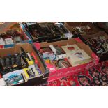 Six boxes (under table) containing boxed model cars including Matchbox, Maisto, Solido, Burago,