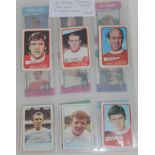 A collection of 26 mixed football cards.