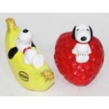 Two United Feature Syndicate Snoopy dog money banks.