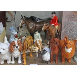 14 Beswick pieces including horses, dogs, tiger etc. Lot also incluses a Border Fine Arts model on