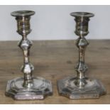 A pair of hallmarked silver candlesticks, height 15cm.