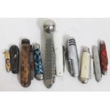 A box of pen knives including a vintage puma combination knife and priest, horn handled etc.