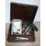 A 19th century mahogany box and contents comprising mainly hallmarked silver, a spectacle case etc.