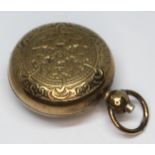 A brass sovereign case.