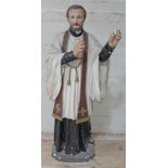 A large plaster figure depicting Saint Francis Xavier, height 102cm. Condition - various losses/