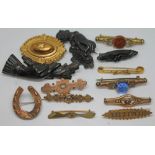 A mixed lot of Victorian and later brooches.