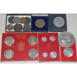 Three Vatican souvenir coin sets and other commemorative coins/medallions.