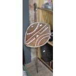 2 metal spears with part wooden shafts, together with shield made from animal hide and hand painted