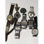 A mixed lot of modern and vintage wristwatches.