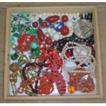 A mixed lot of costume jewellery including coral, bakelite, amber etc.