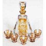 A Bohemian amber flash cut glass decanter and five liquor glasses, decanter height 27cm. Condition -