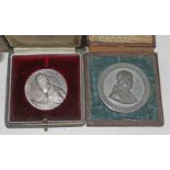 Two cased Vatican medallions each depicting Pope Pius IX 1846-1878.