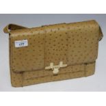 An Ostrich skin handbag, with small ostrich skin purse inside. No makers name on the bag but tag