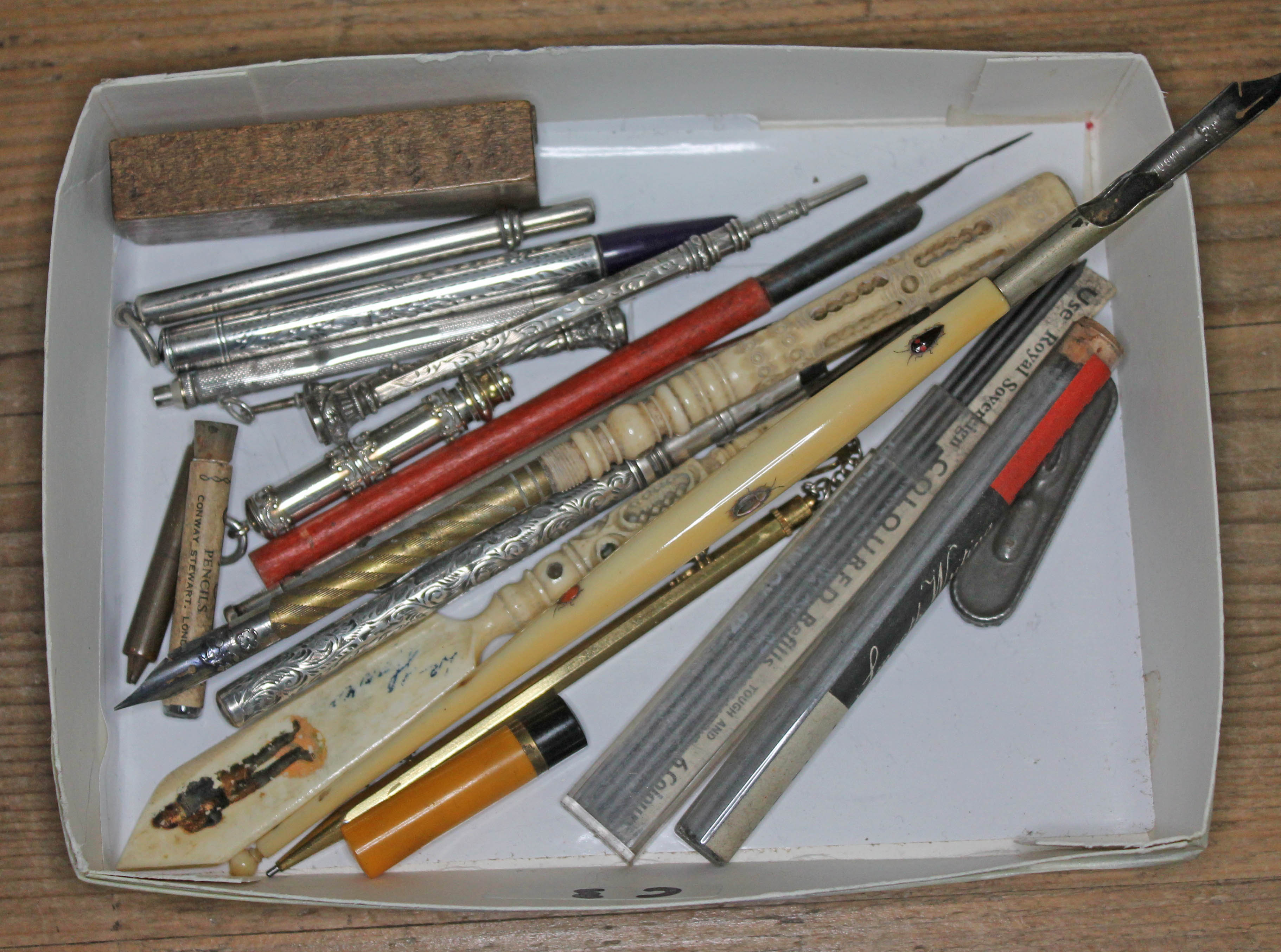 A quantity of propelling pencils and pens including hallmarked silver, Japanese, Stanhope etc.