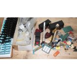 A mixed lot of model railway accessories including 0 gauge track, model vehicles etc.