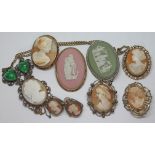 A group of cameo set jewellery, mainly brooches.