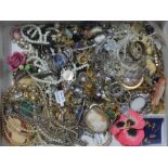 A box of costume jewellery including a cameo pendant, rings etc.