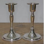 A pair of WMF silver plated candlesticks, height 15.5cm.