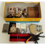 A box of mixed militaria.