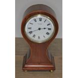 An Edwardian inlaid mahogany 'balloon', the dial signed Butt & Co. Ltd Chester, height 21.5cm.